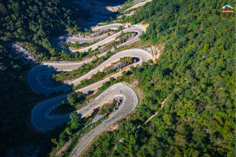 The signature hairpin mountain road of the Ha Giang Loop.